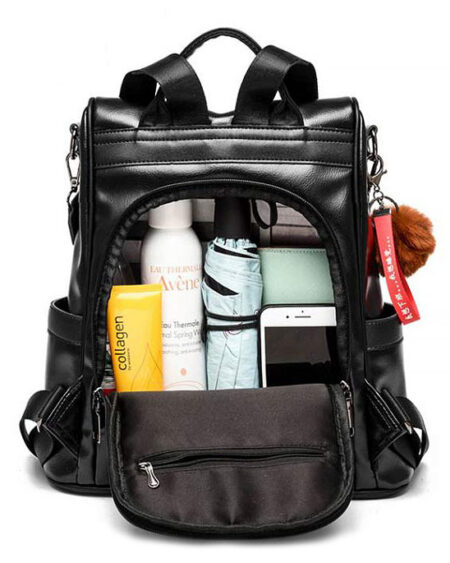 Sac à dos antivol femme BLAIR en cuir noir, convertible, avec pompon.